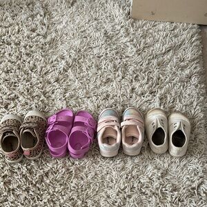 4 pairs of toddler size 6 shoes. Great for play! Sandals and tennis shoes.